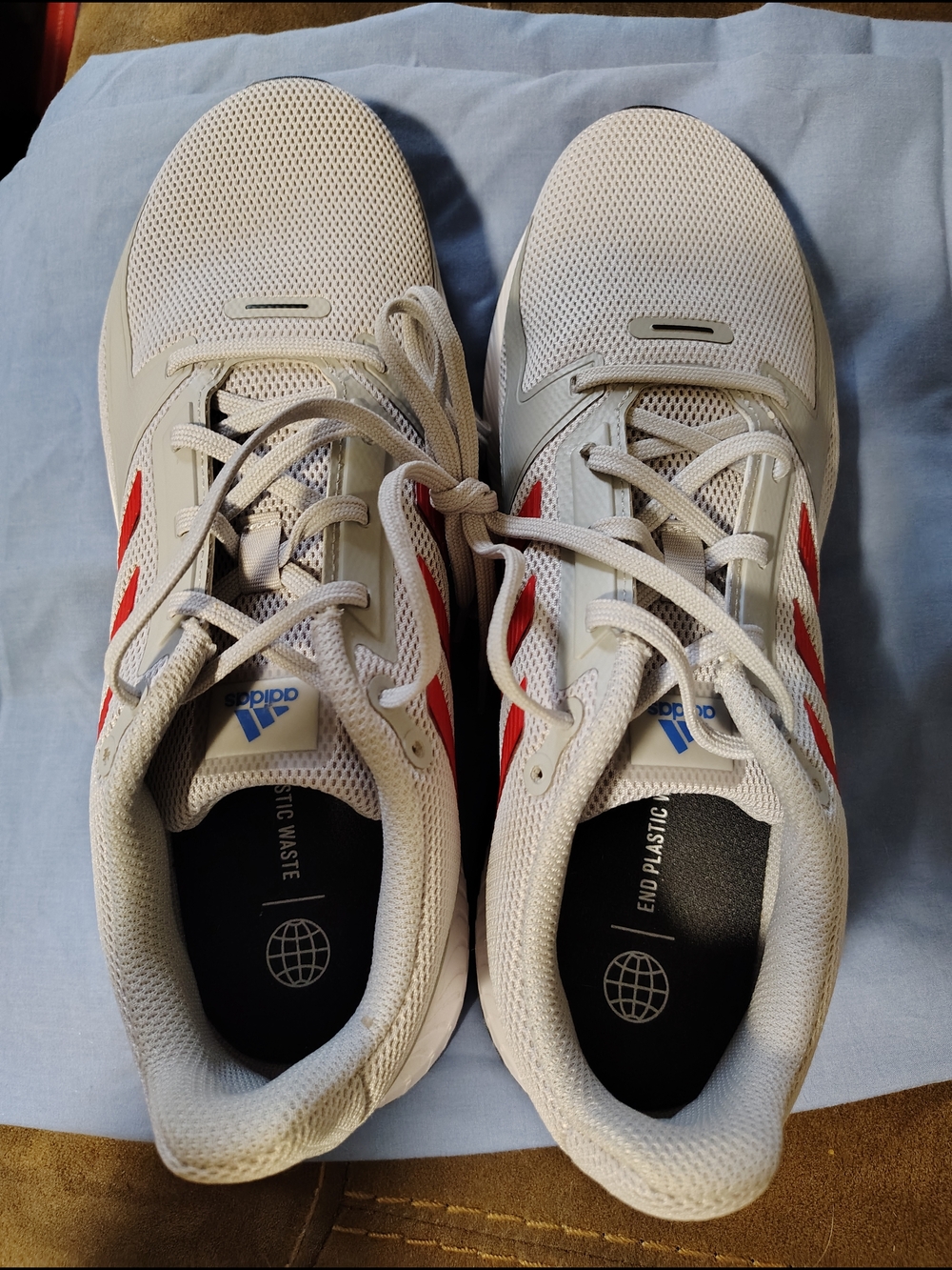 adidas Men’s Athletic Shoes in Off-White with Red Stripes